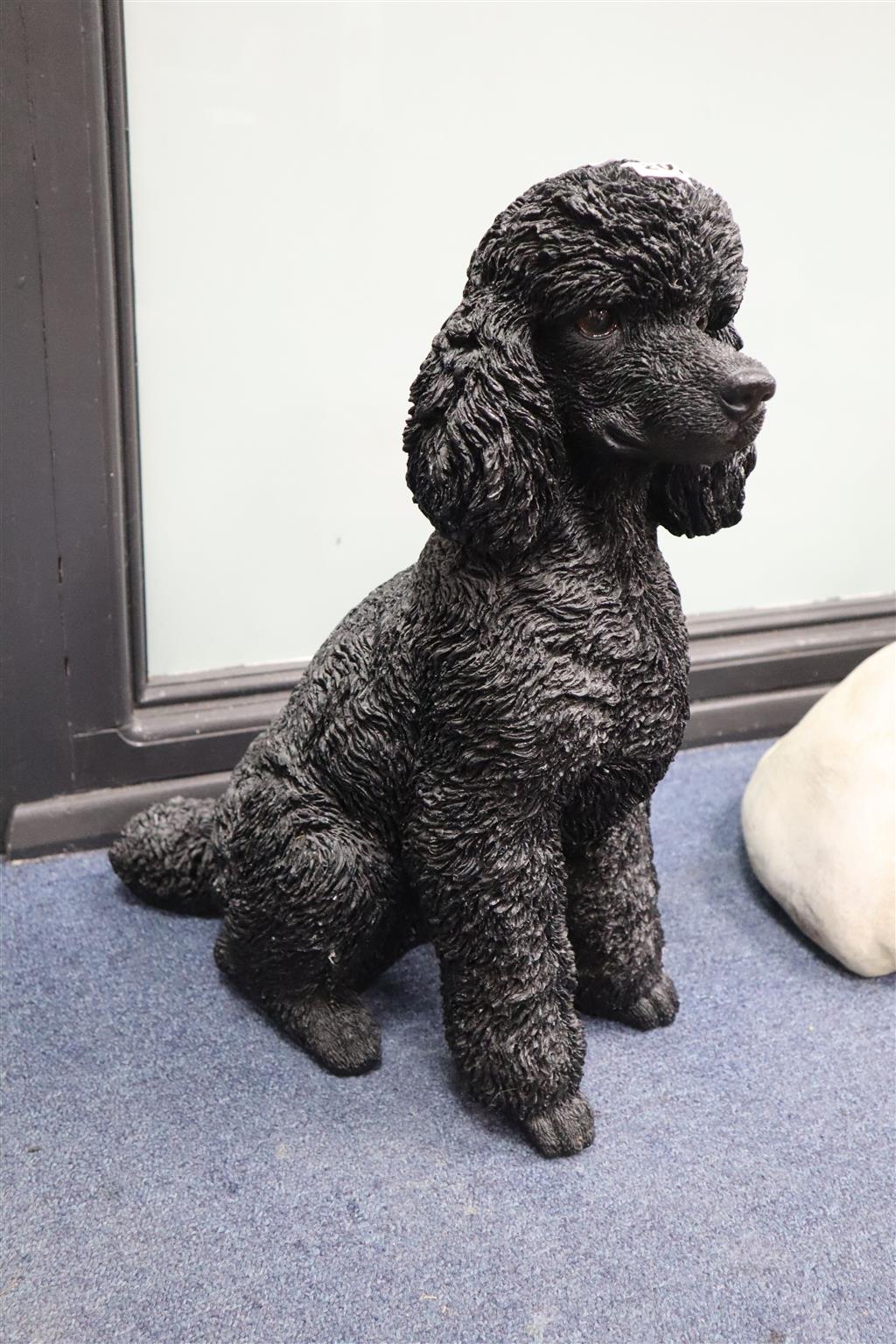 A resin model of a black poodle, height 47cm